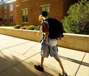 Blind-student-with-backpack-and-cane - Accessibility for Back to School