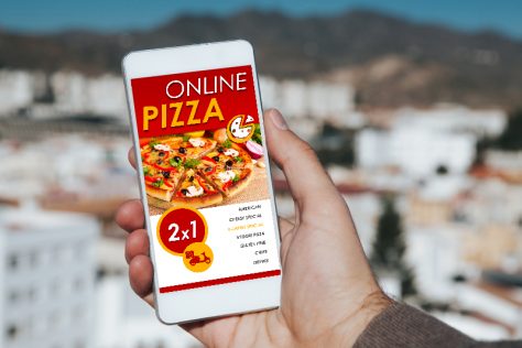 Online pizza app shown on phone