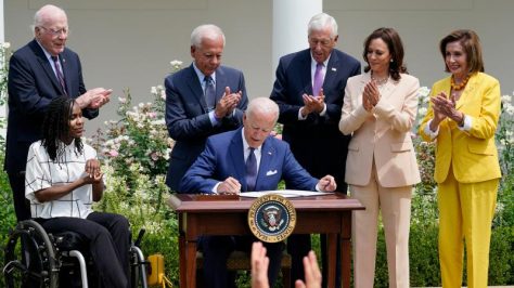 President Biden signing a disability proclamation